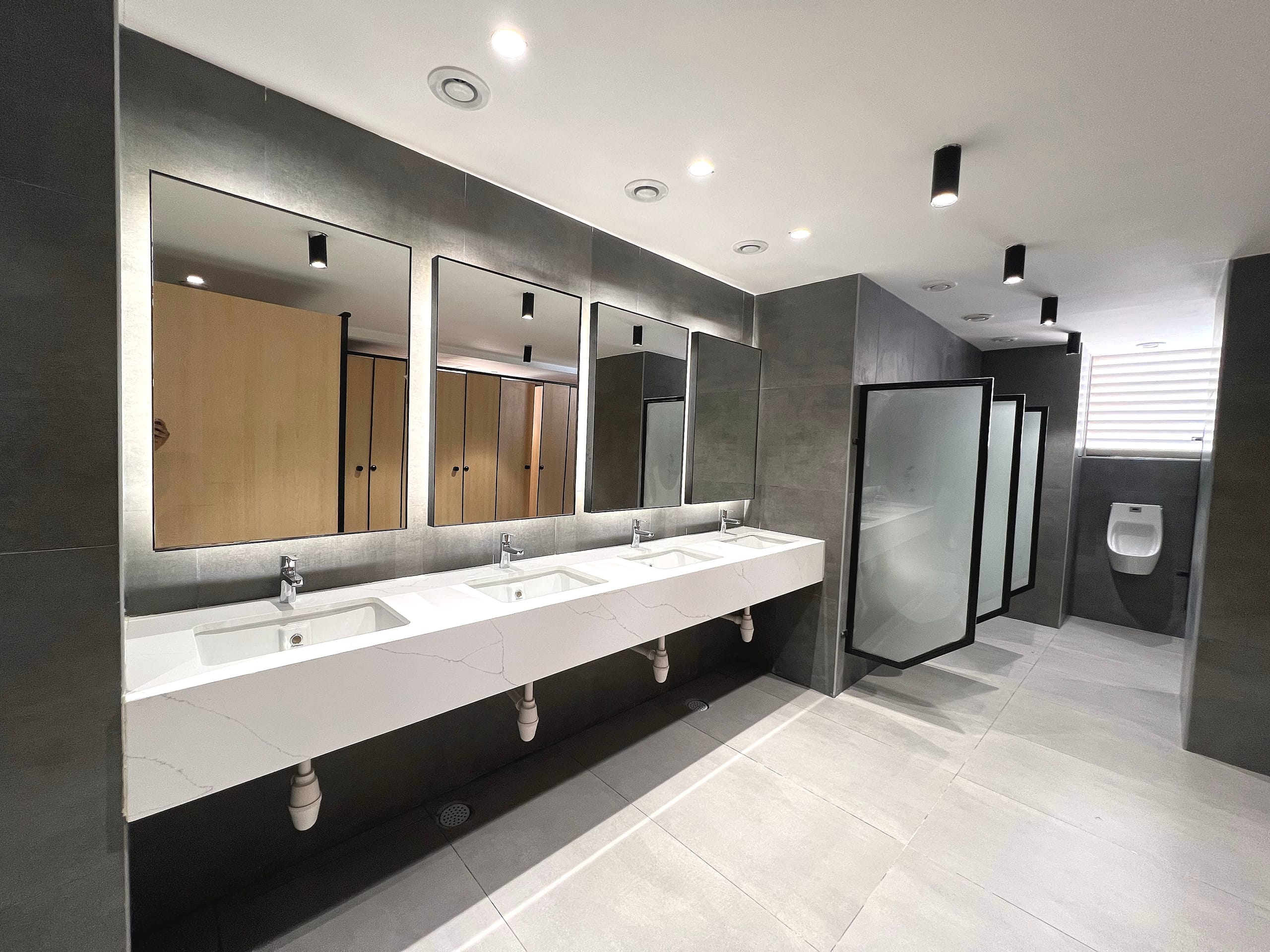 Washroom handwash counter, wide view, at MOSS office