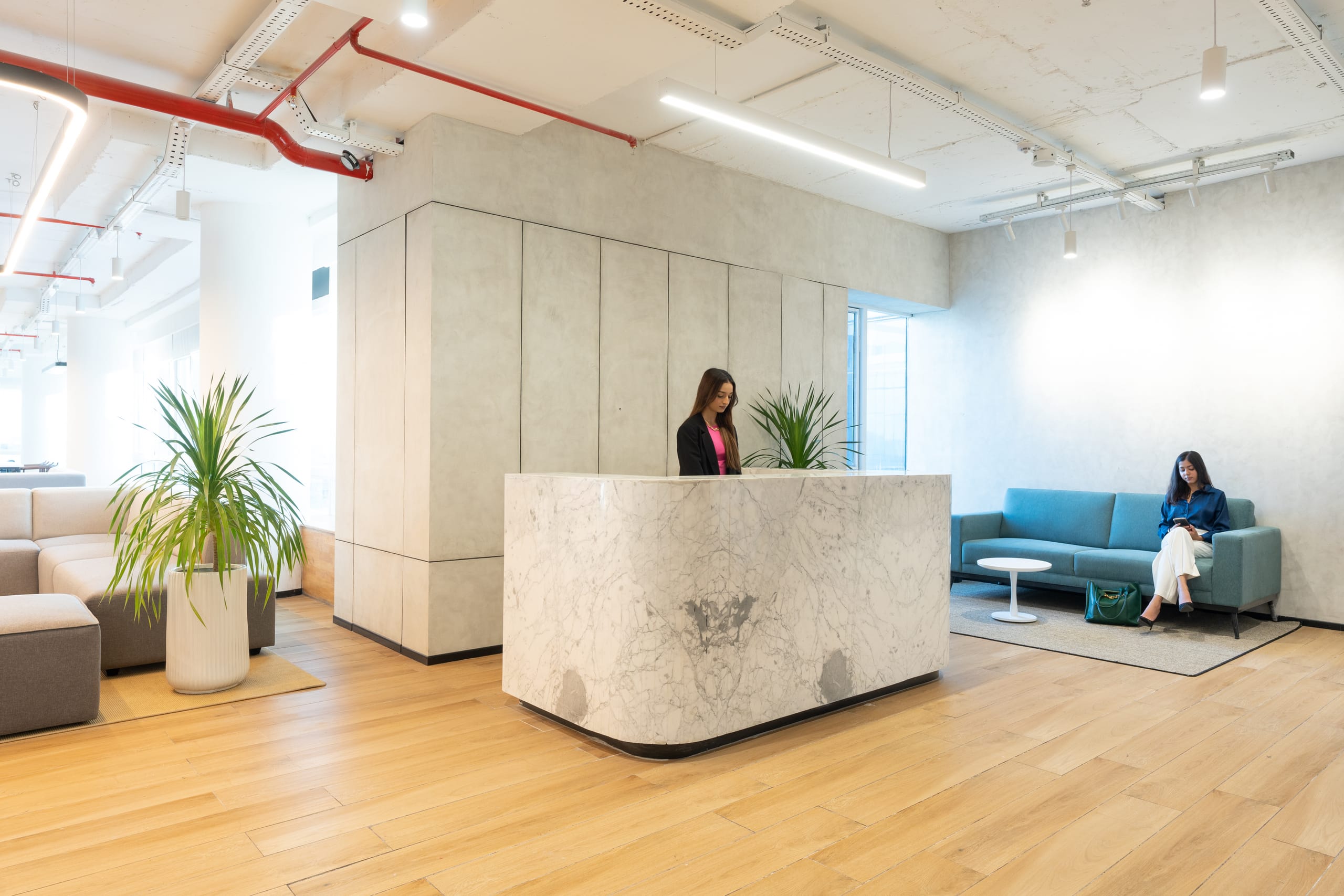 Reception and lobby in warm timber tones at MOSS office