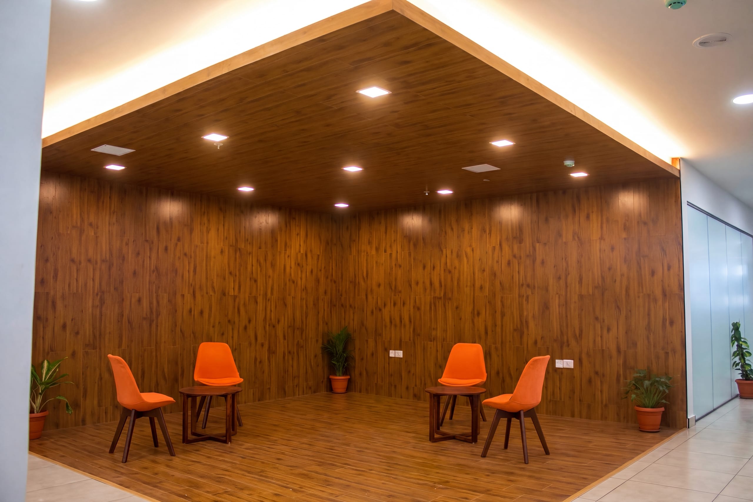 Breakout area with wooden flooring at Temenos office