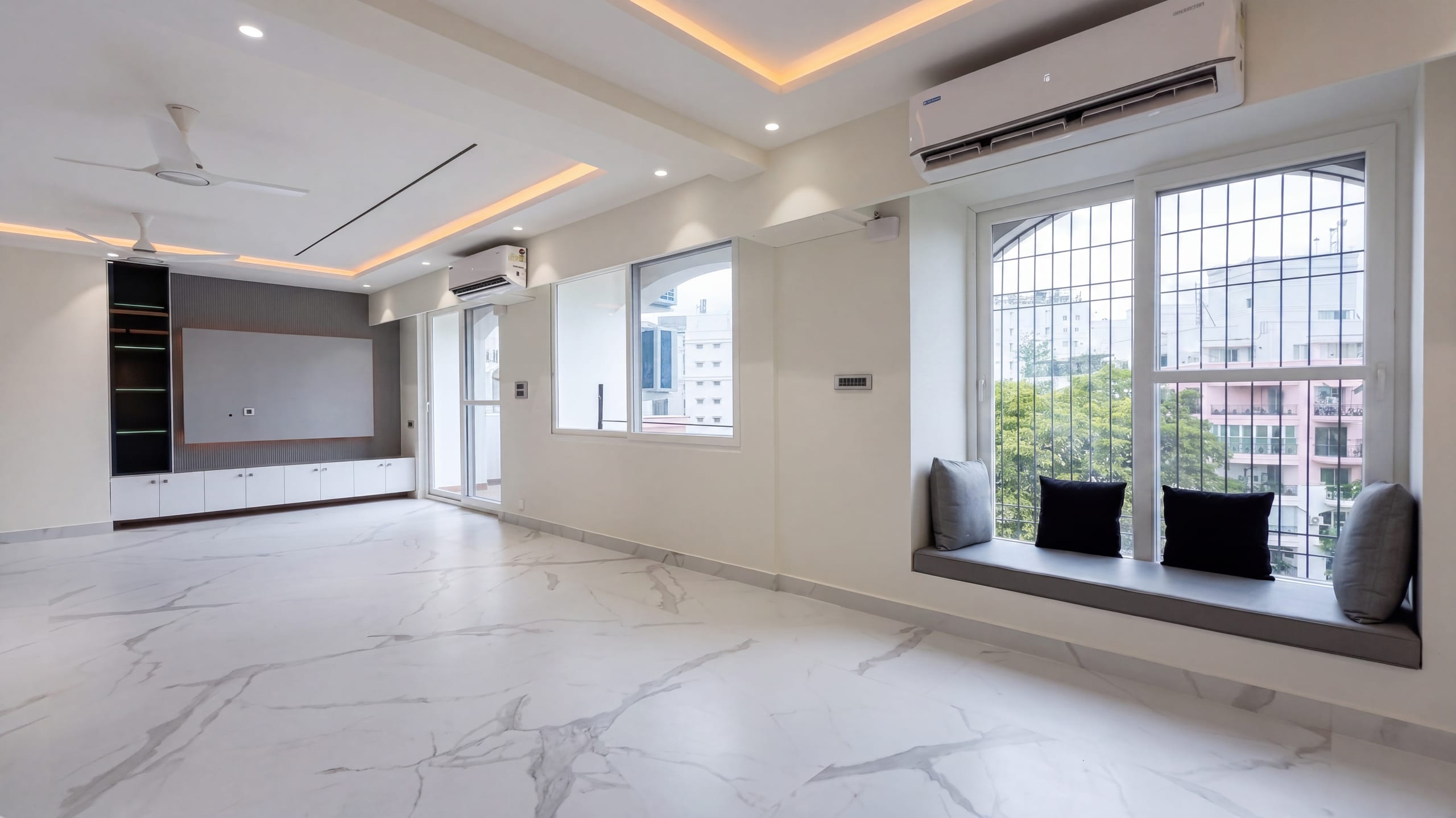 Lower-floor living room, wide view, at the Diamond District penthouse