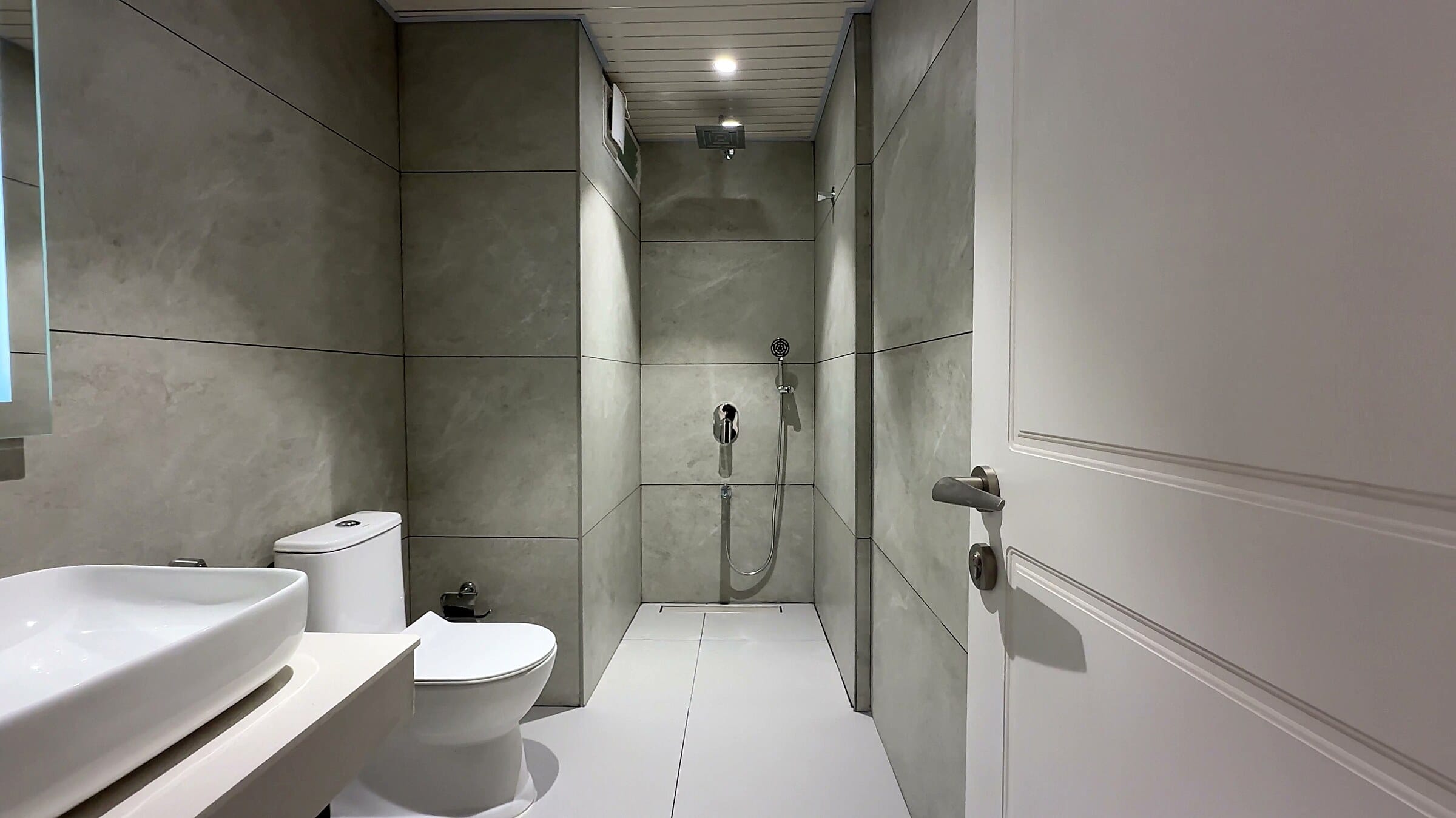 Second bathroom shower, long view, at the L12 apartment