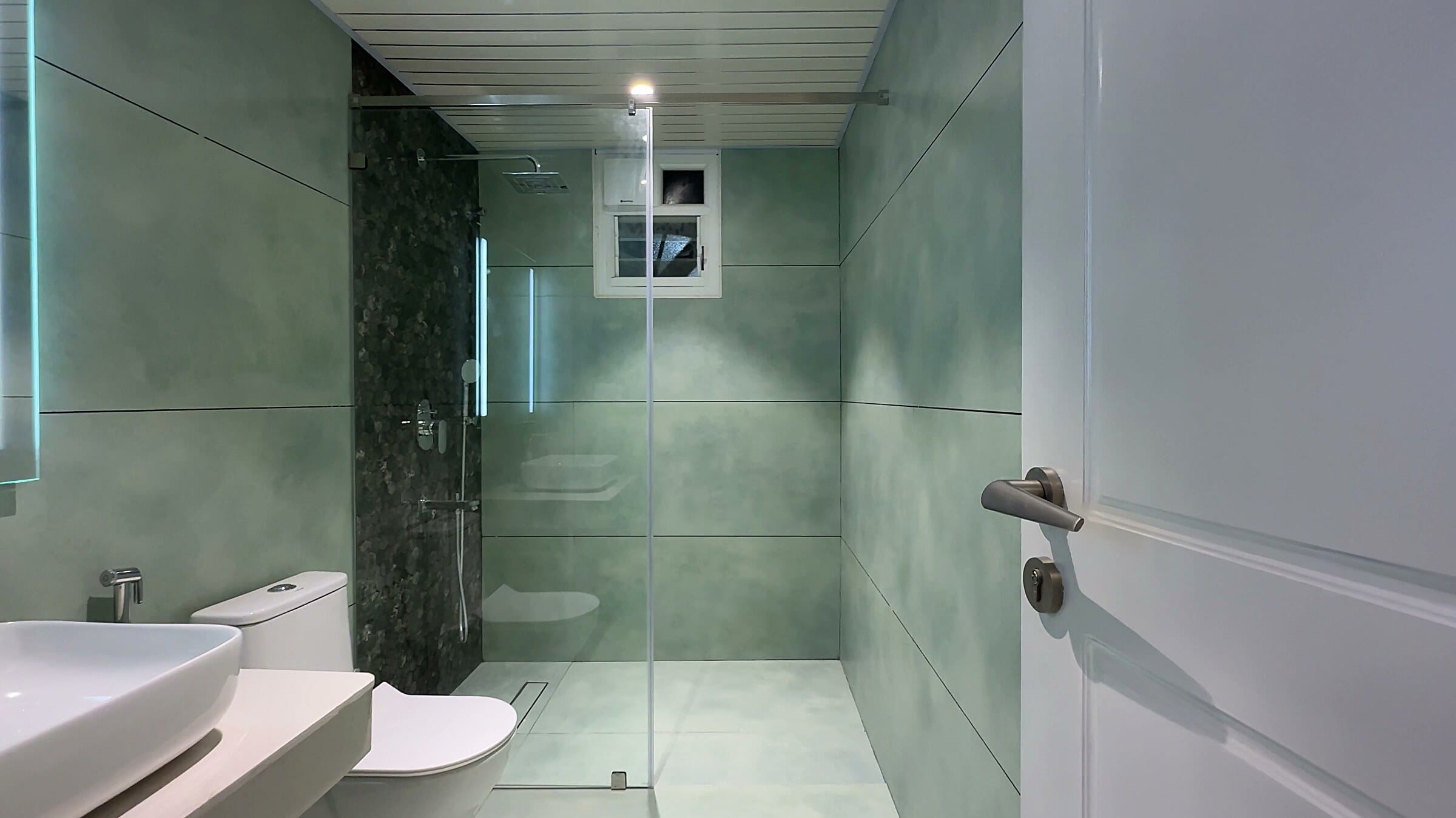 First bathroom, long view, at the L13 apartment