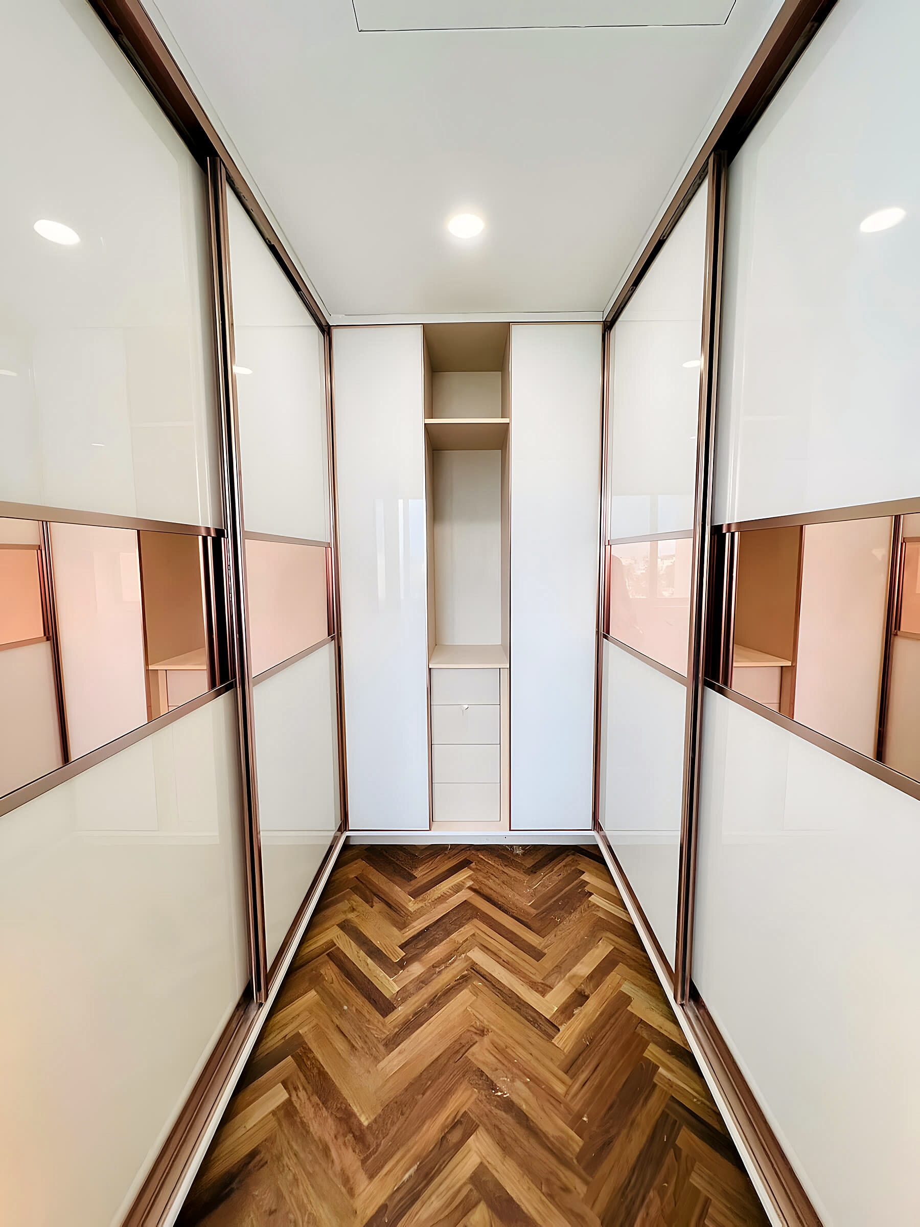 Open white wardrobe at the SMR residence